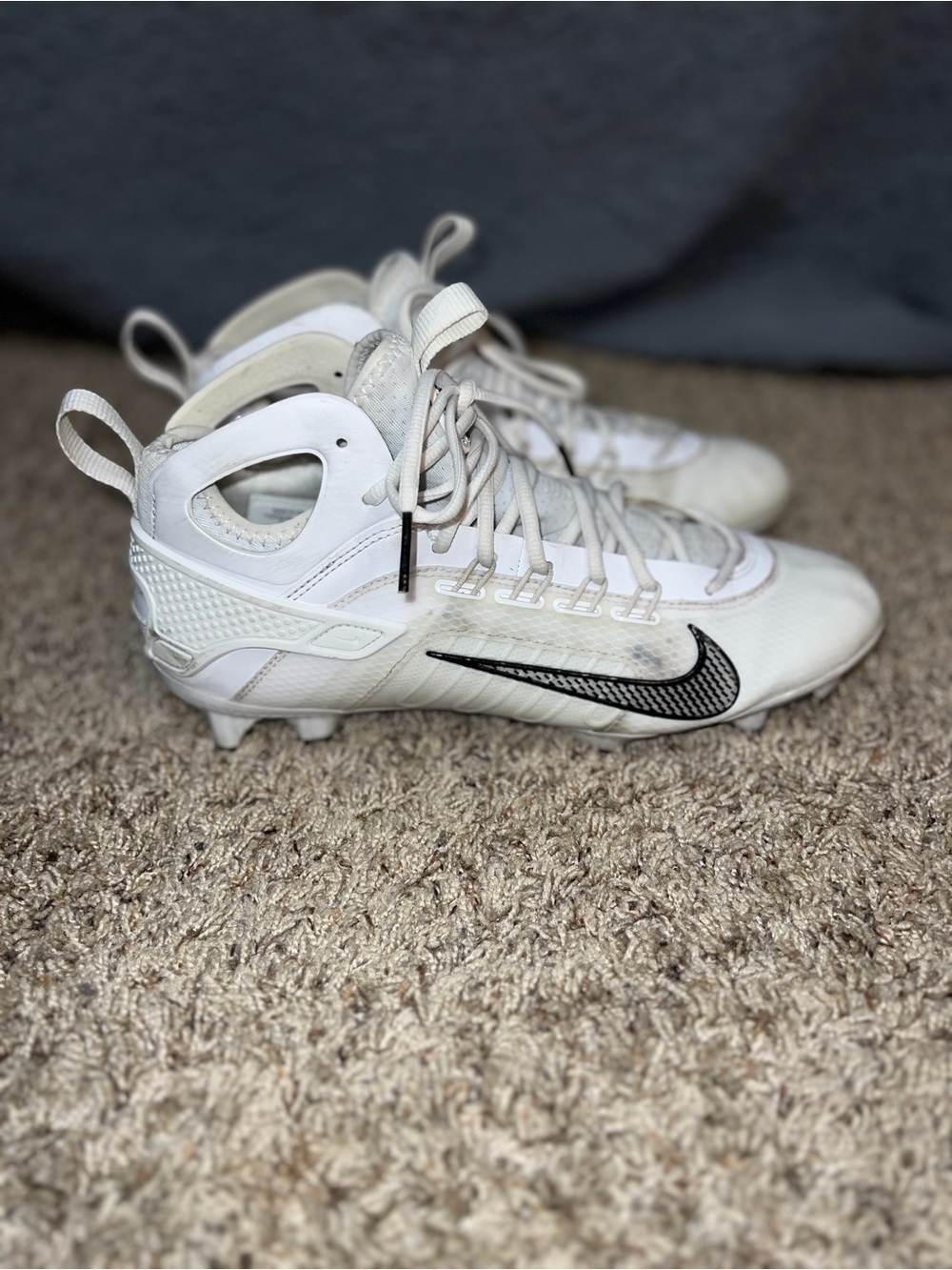 Nike Kids White Cleats with Black Swoosh
